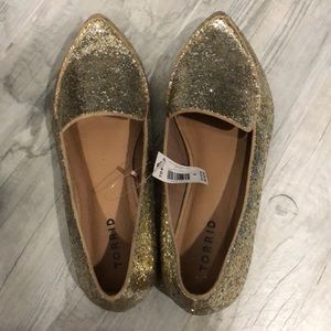 Gold sparkly flats